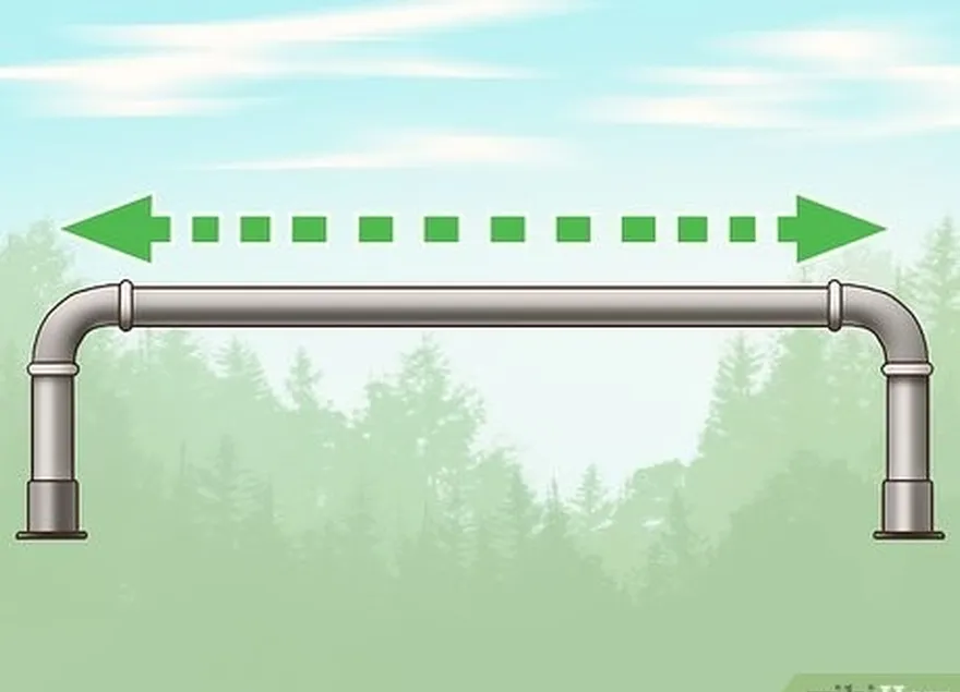 adım 4 çubuğu bir marangoz ile test edin's level to gauge its evenness.