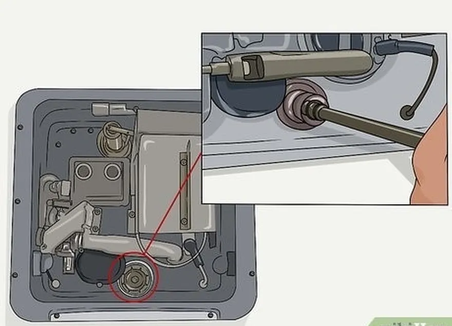 adım 4 depoyu sökün's plug or anode rod with a socket wrench.