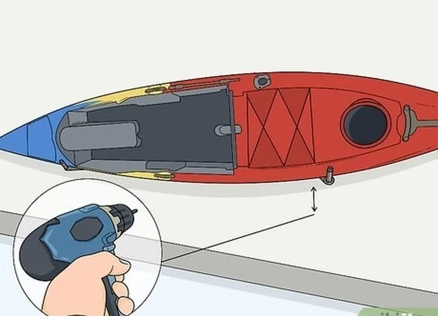 adım 7 askı kollarından yaklaşık 1 inç (2,5 cm) uzaklıkta bir çift pilot delik daha açın.