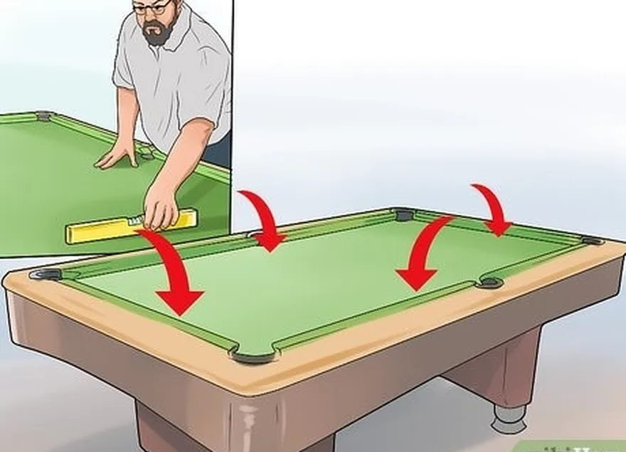 adım 4 marangozu ayarlayın's level on each of the sides of the pool table.