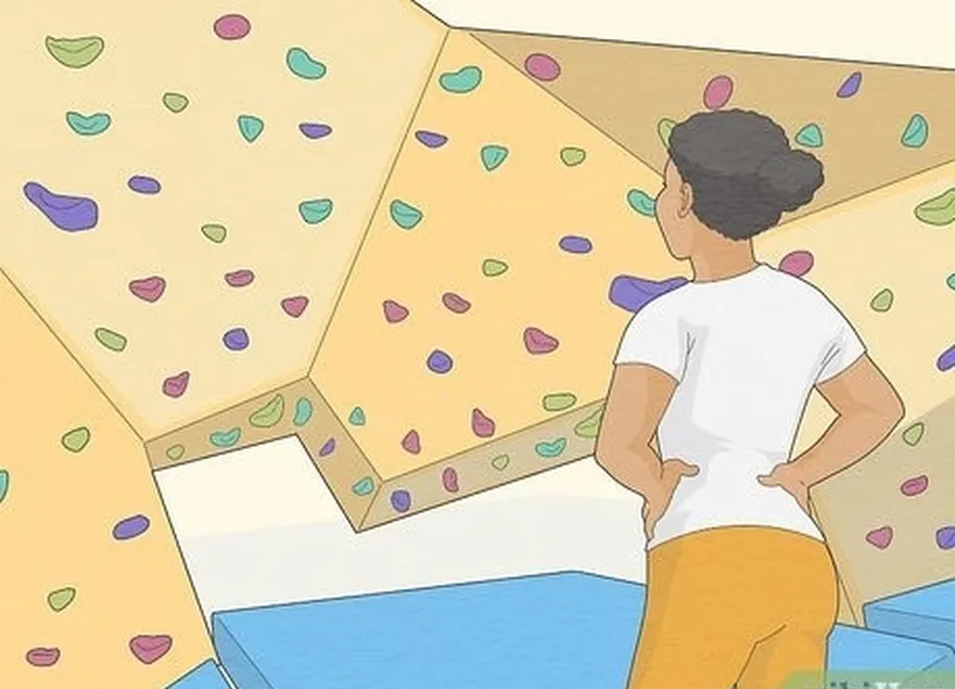 adım 1 temel becerileri ve güvenliği güvenli bir şekilde öğrenmek için bir kaya spor salonuna veya bouldering spor salonuna gidin.