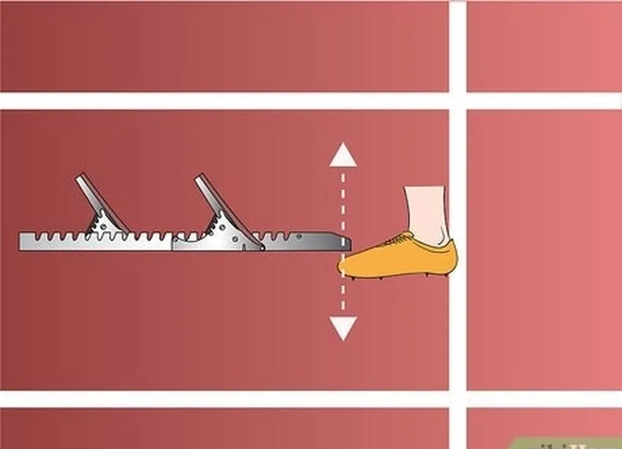 adım 4 blokları ayak parmağınızdan (ana gövdenin ucundaki düz metal parçası) piste sıkıca yerleştirin.